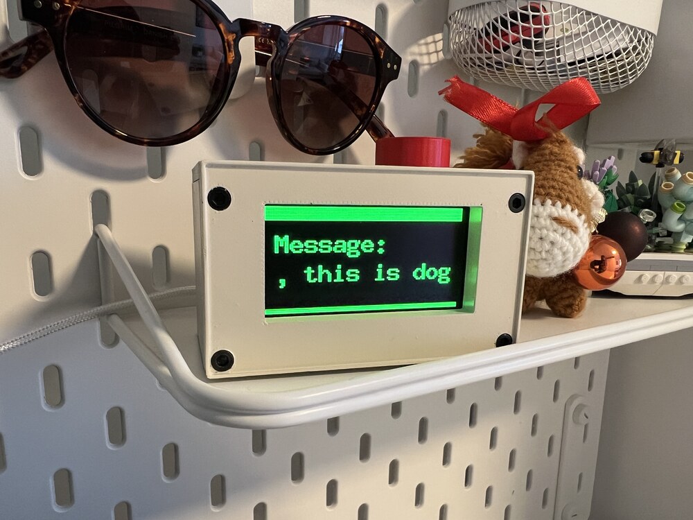 Retro cube showing ", this is dog" which is the last part of a message that did not quite fit on the screen. The complete message was "hello this is dog"