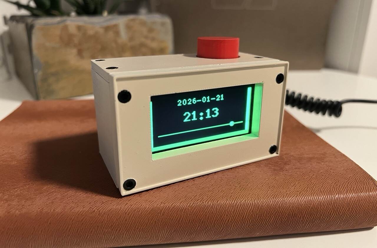 Retro cube in action, showing the housing, display, and rotary encoder.
